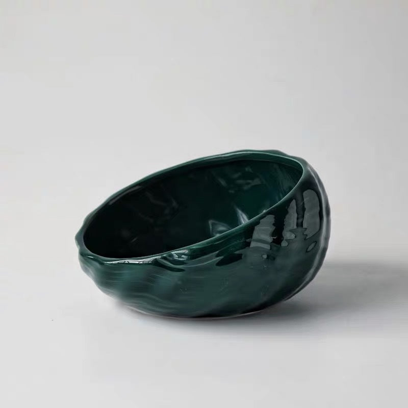 Dark green sculpted ceramic pet bowl